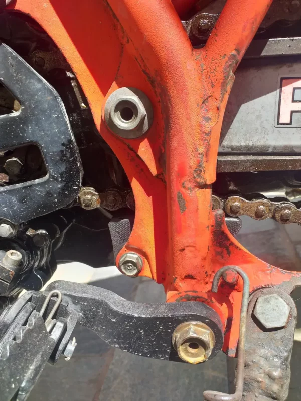 honda-xl250r-lower-chain-slider-installed-customer-photo Customer photo of a installed lower chain slider replacement 52155-KB7-000 mounted on Honda XL250R swingarm