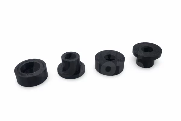 fuel-tank-grommet-92075-1660-top-bottom-separated-set Four separated top and bottom interlocking halves of Kawasaki KLR650 gas tank grommet replacement