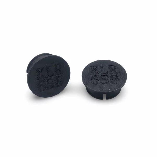 shock-pivot-bolt-cap-klr650-11012-1559-pair-angle Alternate angle showing a pair of UV-resistant ASA shock pivot caps for Kawasaki KLR650 and Tengai